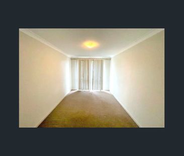 COSY UNIT IN CONVENIENT LOCATION! - Photo 1