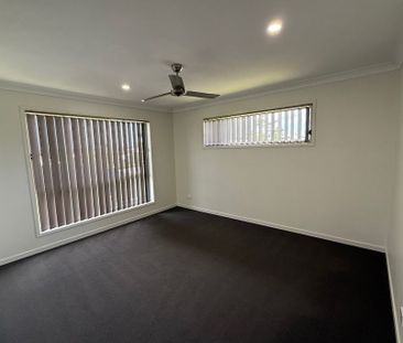 Beautiful 4-Bedroom Family Home with Study & Outdoor Entertaining Area - Photo 1