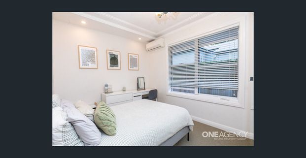 AVAILABLE NOW - Stylish and Convenient Family Home - Photo 1