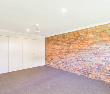 Spacious 3-Bedroom Top Floor Unit with Ocean Views & Character Feat... - Photo 1