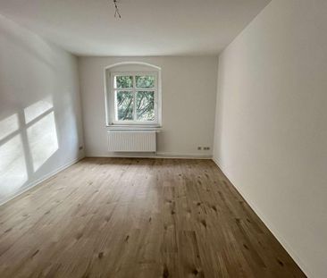 Helle Erdgeschosswohnung – mit Einbauküche & Pachtgarten auf Wunsch - Photo 4