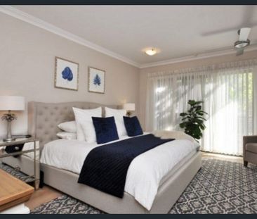 Spacious 3-Bedroom Home with Entertaining Balcony Near the City & O... - Photo 5