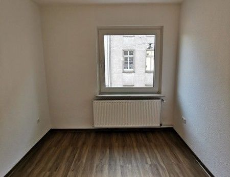 Gemütliche 2-Zi.-DG-Whg. in der Veilchenstr. - Foto 1