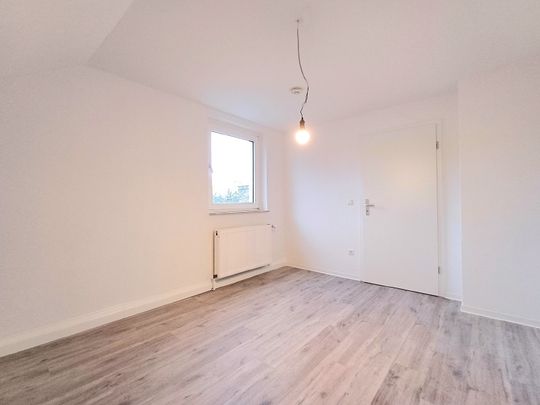 Dachgeschosswohnung in gepflegtem Wohnhaus - Photo 1