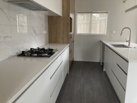 Step into luxury and sophistication with this four-bedroom plus study home, designed to exceed your expectations. - Photo 4