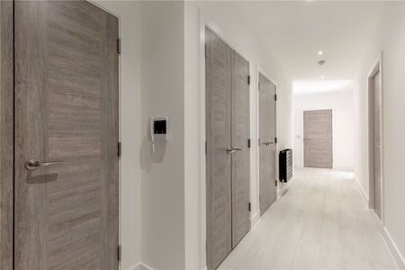 A modern unfurnished two bedroom flat with private parking and a balcony in this stunning new development. - Photo 3