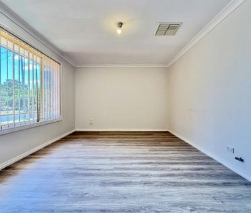 Charming 4-Bedroom Family Home with Relaxed, Low-Maintenance Living - Photo 1