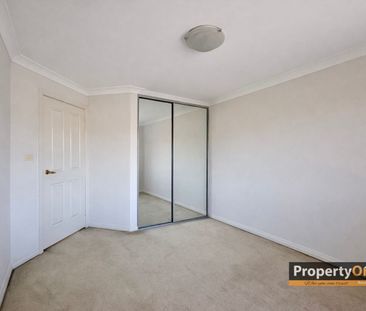 *Modern 2-Bedroom, 3-Bathroom Townhouse in Prime Location* - Photo 2