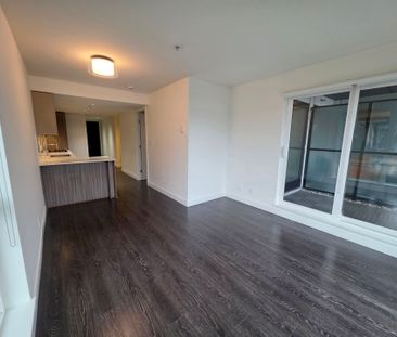 Stylish One Bedroom + Den Residence with Private Balcony - Photo 4