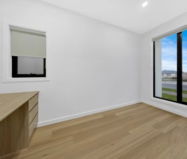 BRAND NEW LUXURY LIVING IN DEVELOPING ESTATE OF WOLLERT - Photo 1