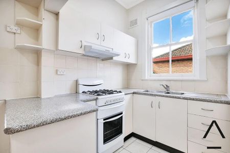 Two Bedroom Duplex Masterpiece Offering Convenience - Photo 5