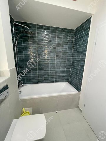 De inchiriat garsoniera la etajul 1 cu balcon si loc de parcare in cartierul Da Vinci din zona de Vest Sibiu - Fotografie 3