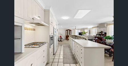 Waterfront Family Home with Pool & Triple Garage - Photo 5