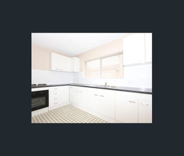 Modern Comfort & Location 2-Bedroom Brick Unit in the Heart of Mans... - Photo 6