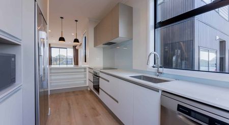 Modern 3-Bedroom Home with Sea Views in the Heart of Hobsonville Point - Photo 2