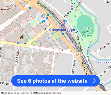 QUIET GROUND FLOOR LIVING, CONVENIENT LIFESTYLE LOCATION - Photo 1