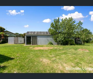 Renovated West End Home With Brilliant Shedding! - Photo 4