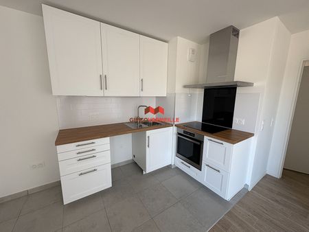 AUBERGENVILLE - Photo 2