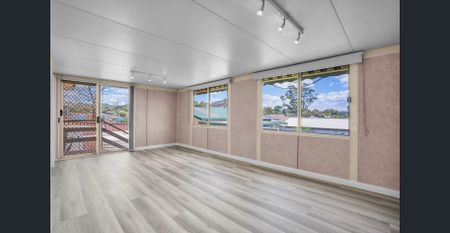 Updated three-bedroom home - Photo 2