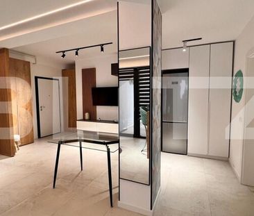 Apartament, de inchiriat, cu 2 camere, 55 mp, zona centrală - Fotografie 2