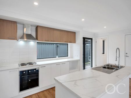 Open the Door to Modern Comfort and Easy Living in Woodville Gardens - Photo 4