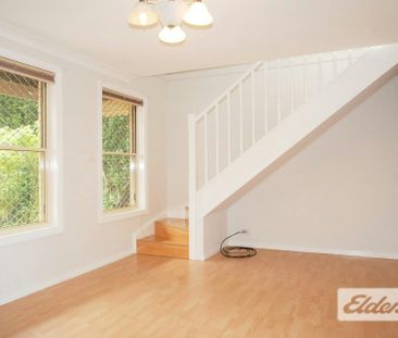 Spacious Two-Bedroom Townhouse Plus Study with Private Courtyard - Photo 1