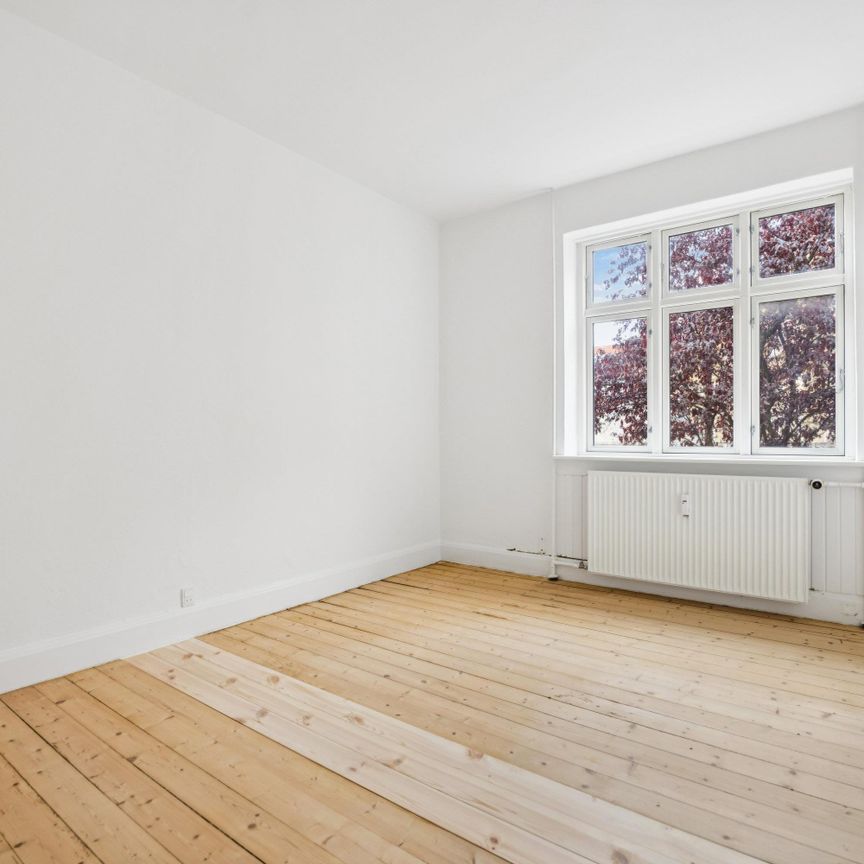 <b>Lys og indbydende 3-værelses lejlighed i Ø-gaden</b><br> - Photo 1