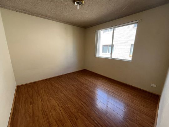 For Rent: Spacious 2-Bedroom Unit in Prime Location! Conveniently Located Near Shops & Train Station - Photo 1