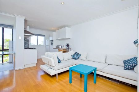 Near shops, train line & beach... this lovely 1 bedroom, furnished apartment is ready for Summer! - Photo 2