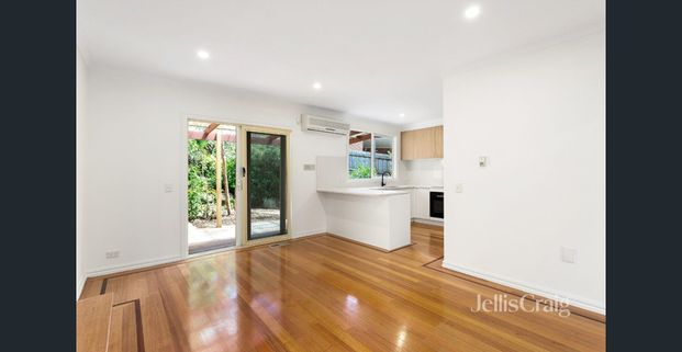 UPDATED 3 BEDROOM TOWNHOUSE - Photo 1