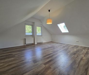 Traumhafte Obergeschosswohnung – modern, lichtdurchflutet und nur w... - Foto 1