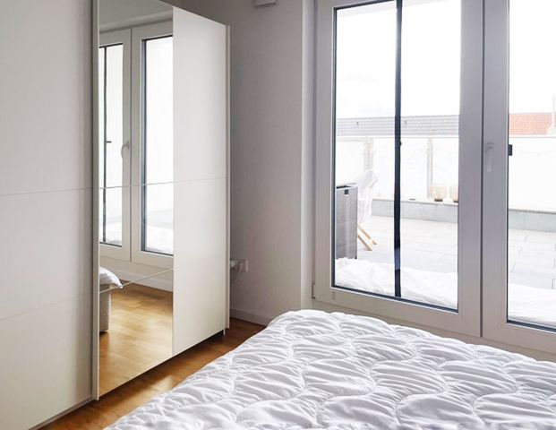 Zwei-Zimmer-Penthouse-Wohnung mit Balkon und TG-Platz - Foto 1