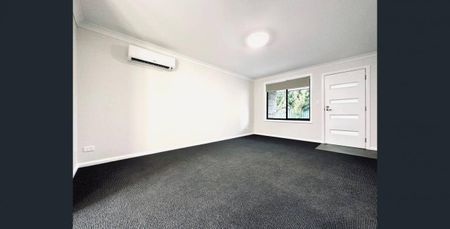 Modern 2-Bedroom Unit in Secure Gated Community - Photo 2