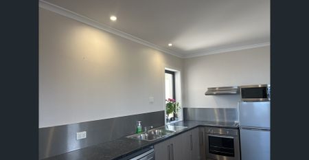 Apartment living without the city hustle and bustle - Photo 2