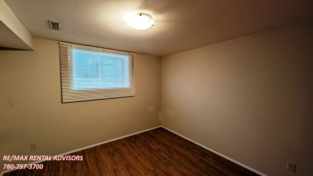 SPACIOUS 4 BED, 2 BATH, BUNGALOW HOME WITH A DOUBLE DETACHED GARAGE IN THE COMMUNITY OF CAPITAL HILL - Photo 1