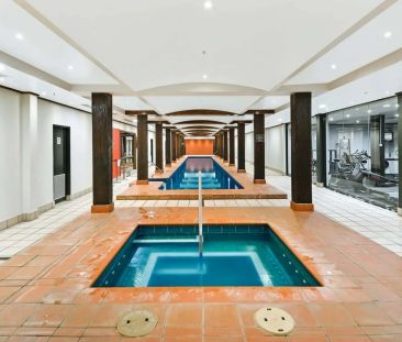 Beautifully Renovated Apartment in the Iconic Goldsbrough Building - Photo 6