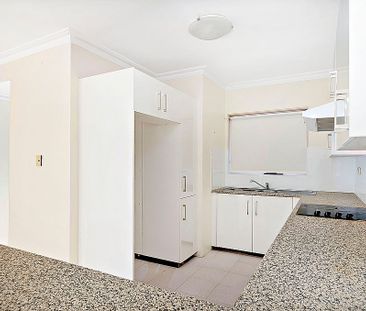 Serene Living Awaits - Beautifully Appointed Two-Bedroom Townhouse - Photo 3