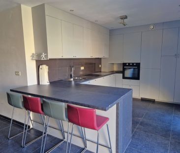 Gelijkvloers appartement met 4 slaapkamers en tuin - Photo 6