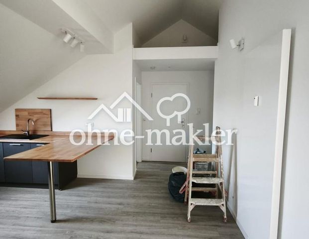 Erstbezug: Wunderschöne Dachgeschosswohnung in bester Lage - Photo 1