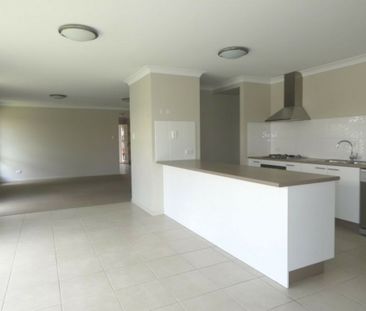 CENTRALLY LOCATED 4 BEDROOM FAMILY HOME - Photo 2