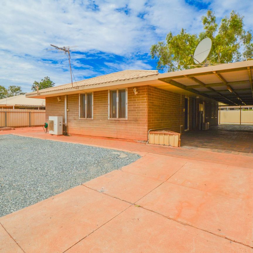 THREE-BEDROOM BRICK HOME WITH SPACE, SECURITY & LOCATION - Photo 1
