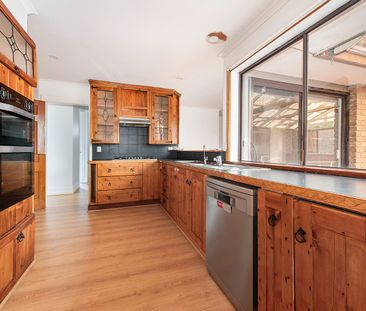 Freshly updated 4-Bedroom, 2-Bathroom Home in a Family-Friendly Loc... - Photo 6