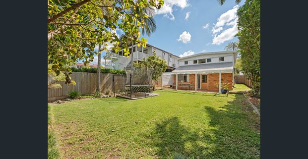 🌿 Modern Family Living in the Heart of Graceville - Photo 1