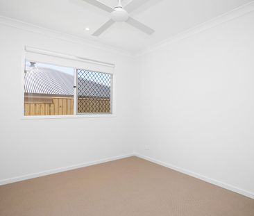 Spacious 4-Bedroom Home in the Heart of Redbank Plains! - Photo 5