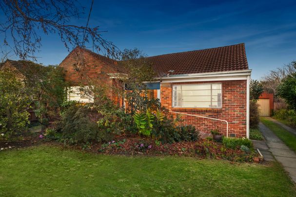 FAMILY ORIENTED THREE BEDROOM HOME IN GOOD LOCATION ! - Photo 1