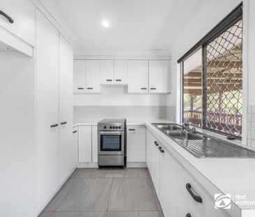 THREE BEDROOM FAMILY HOME IN BIRKDALE WITH A LARGE FULLY FENCED REA... - Photo 6