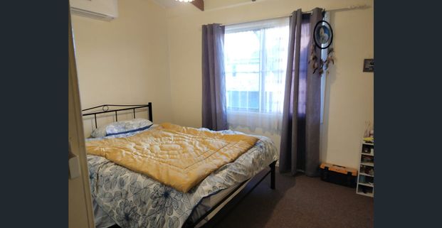 2 BEDROOM UNIT WITH PRIVATELY FENCED BACKYARD - Photo 1