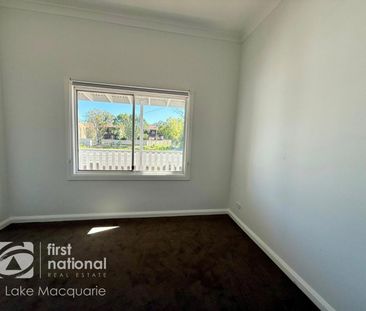 RENOVATED 2 BEDROOM UNIT - LAWN MAINTENANCE INCLUDED - Photo 4