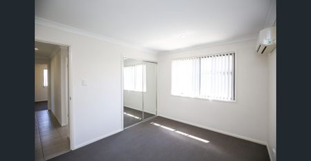 MODERN 4 BEDROOM, 2 BATHROOM HOME WITH MEDIA ROOM & DOUBLE BAY SHED! SOLAR PANELS + GAS HOT WATER! - Photo 4