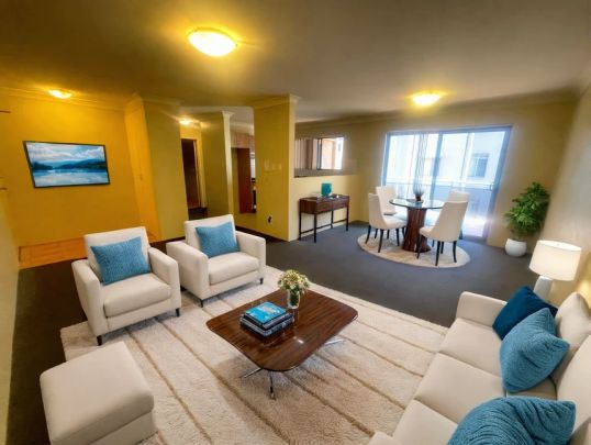 Spacious & Modern Apartment in a Secure, Ultra-Convenient Location - Photo 1